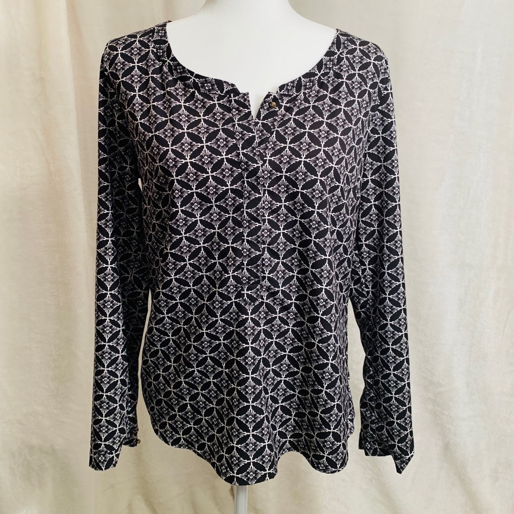 Black and white patterned blouse